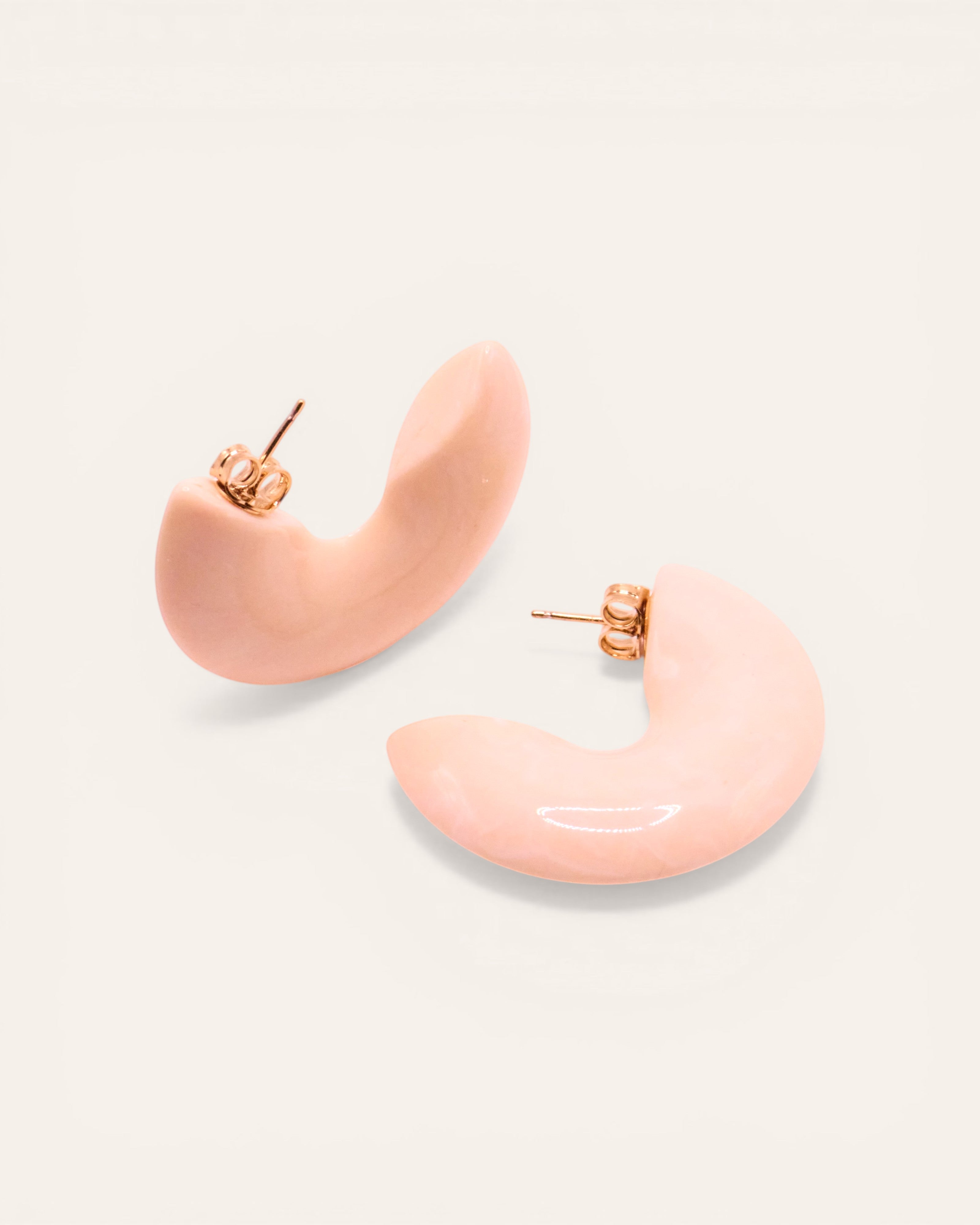 Aglaia Nelia large ivory resin hoop earrings with unique marbling effect, 1.5cm width.