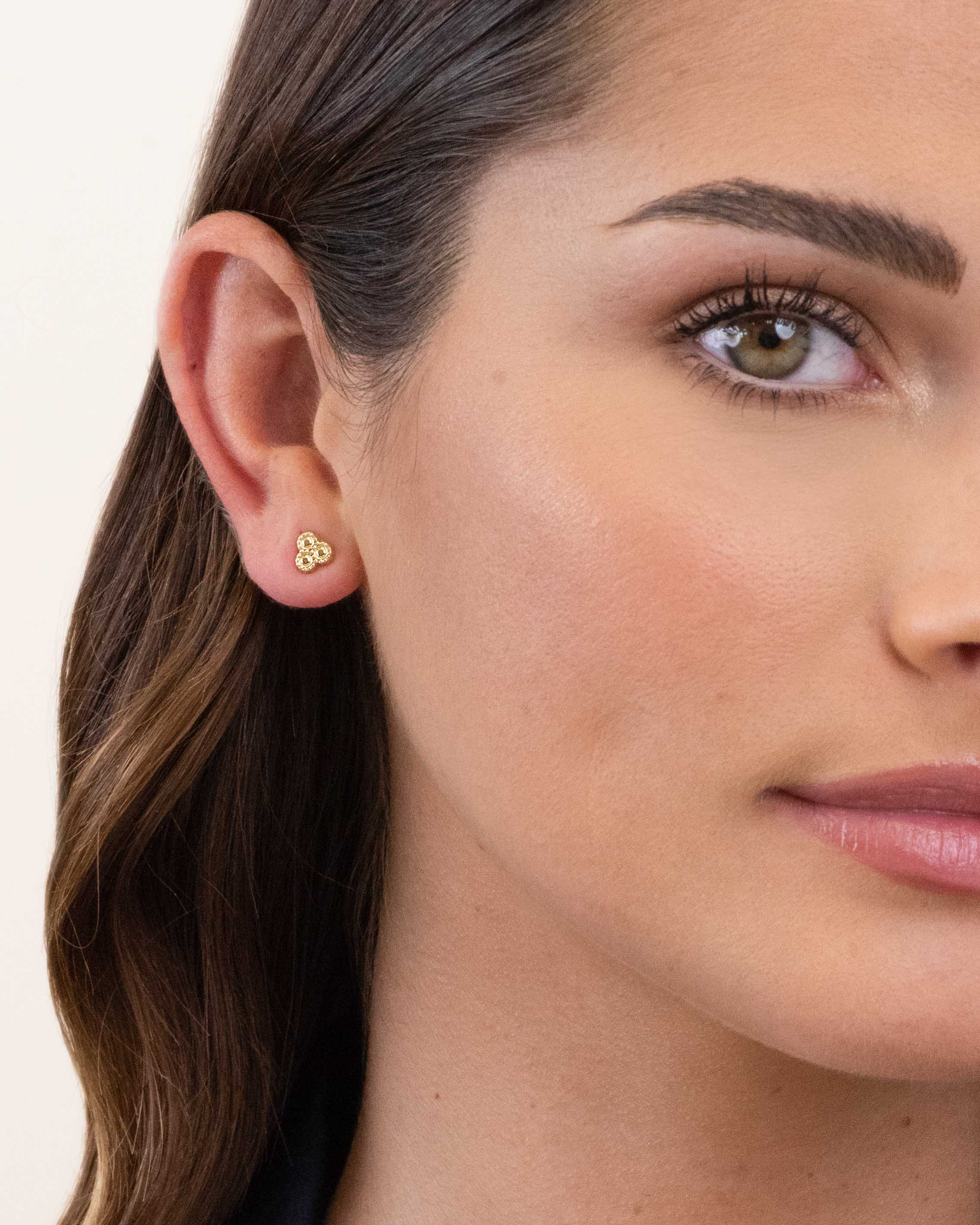 Small earring forming three tiny circles, 3-micron gold-plated, made in France.