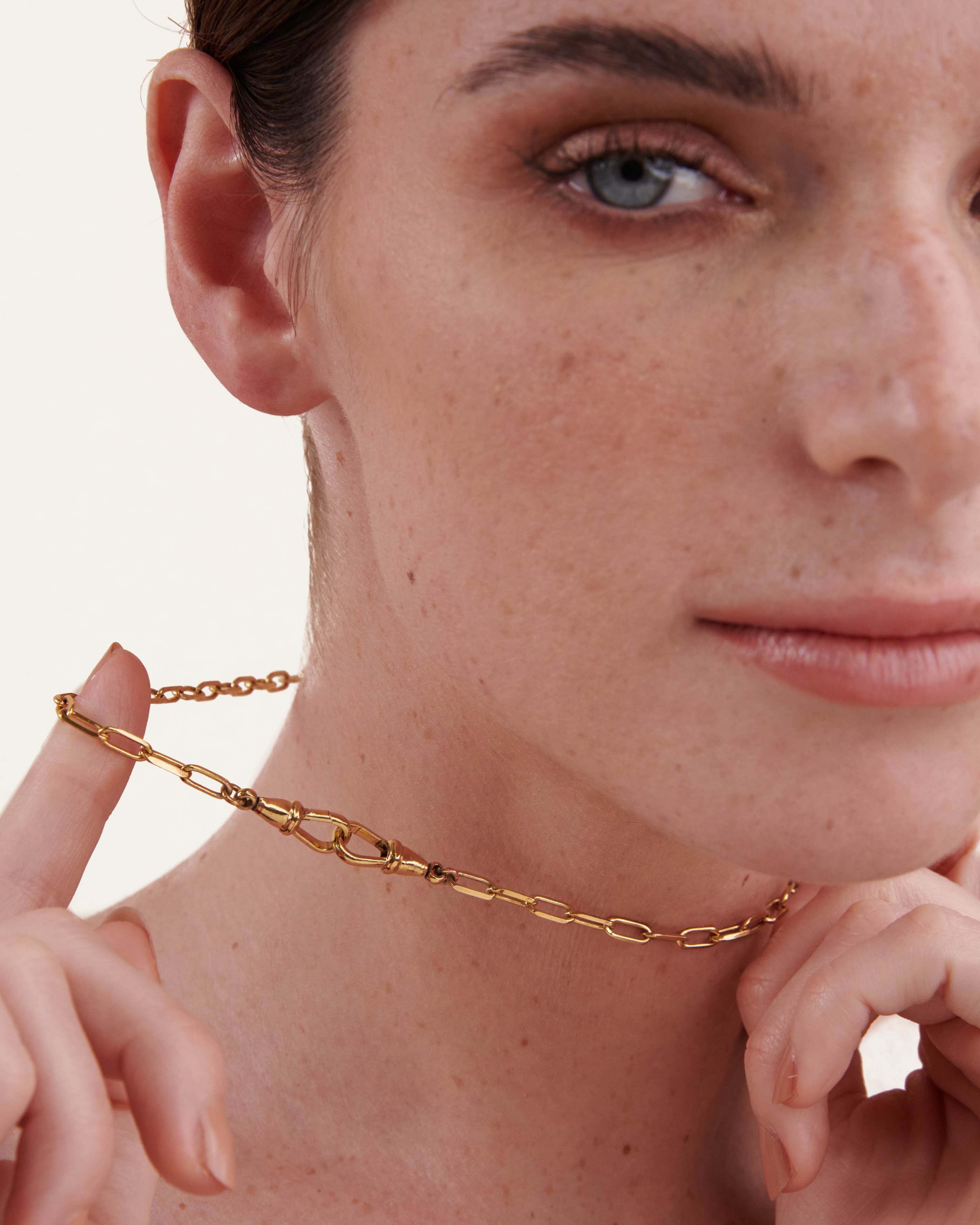 Necklace with wide rectangular links and a round spring-ring clasp, gold-plated (3 microns), made in France.