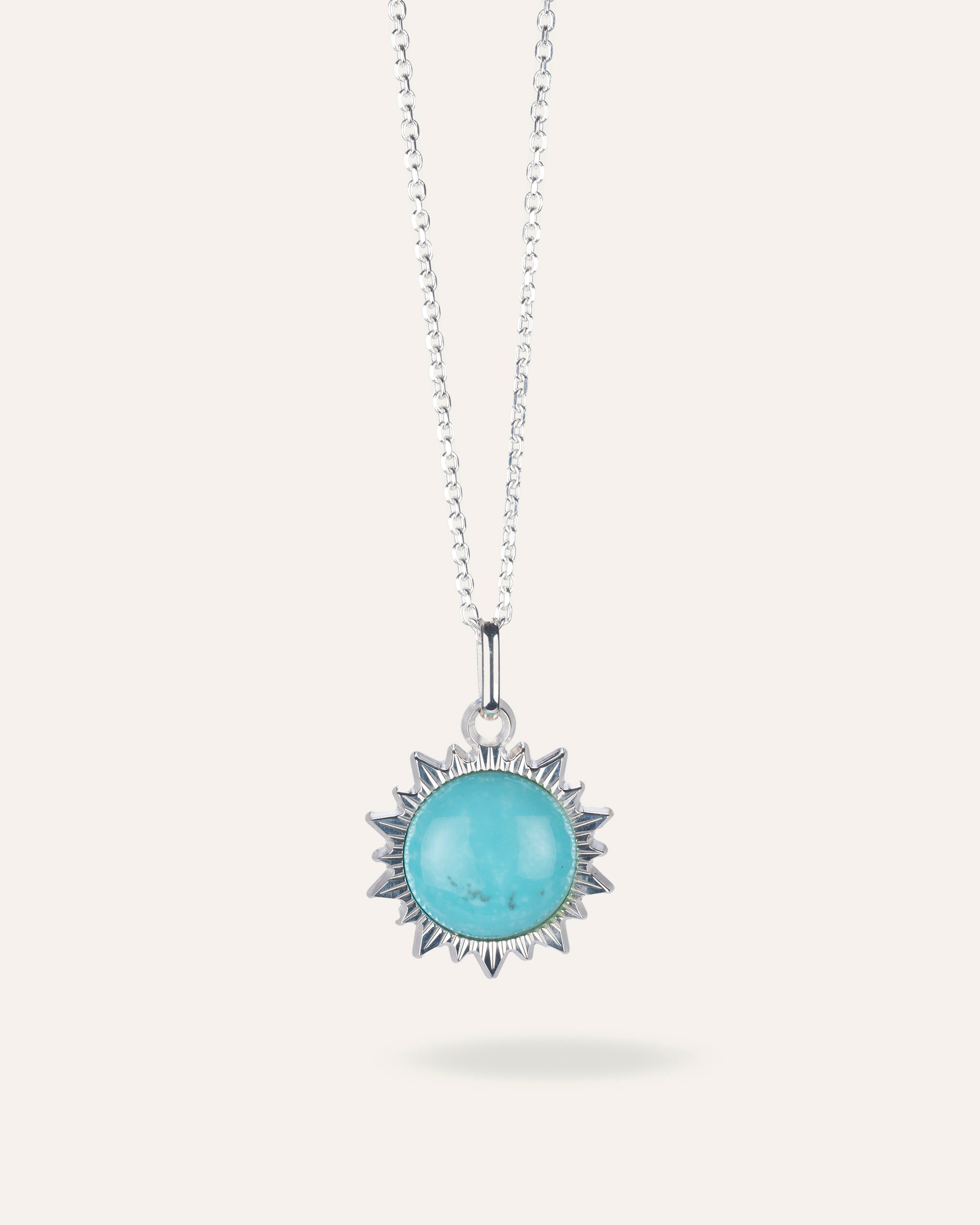 Silver and turquoise sun necklace