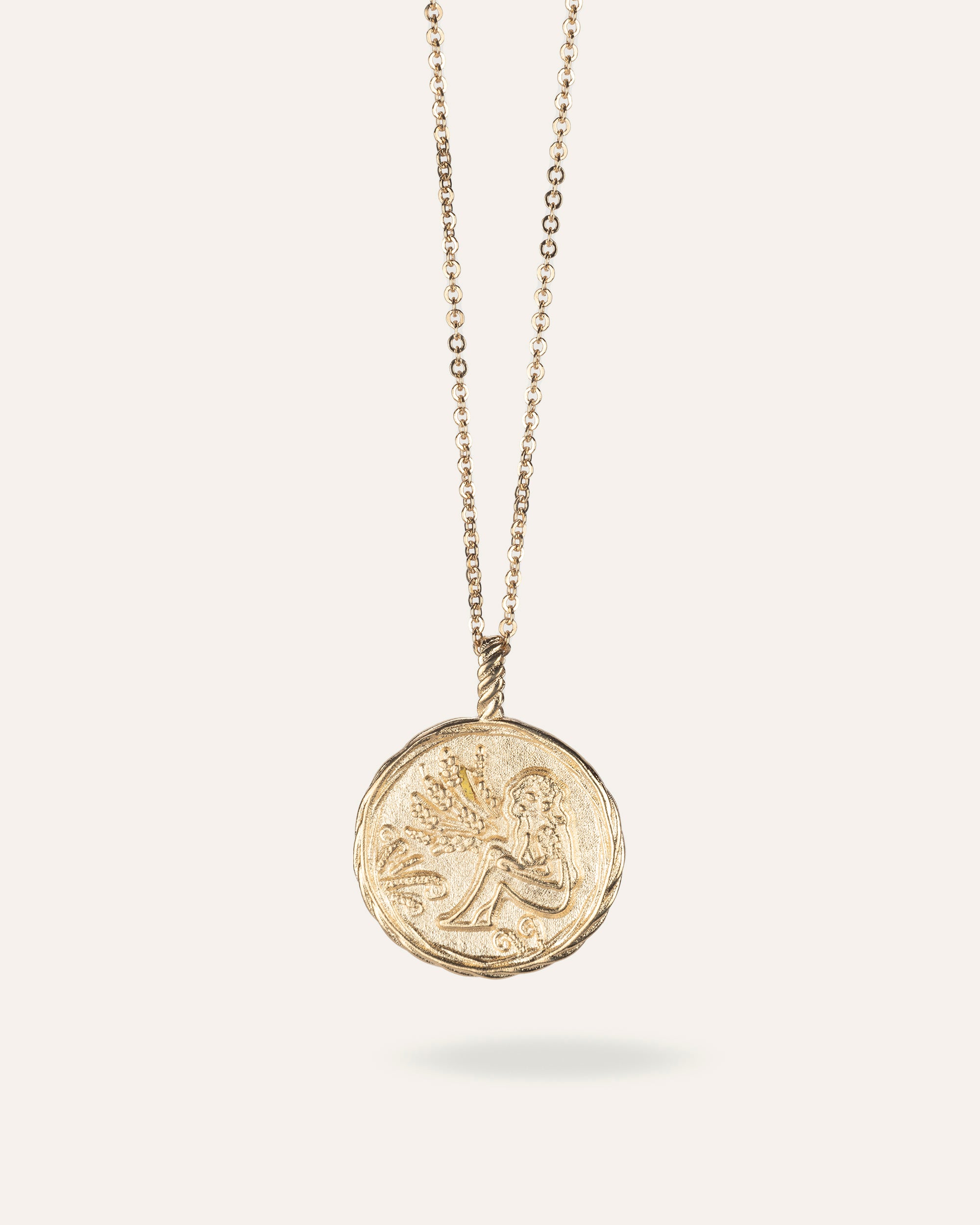 Collier en chaîne forçat en plaqué or 3 microns composé d'une médaille au signe astrologique Vierge made in France.