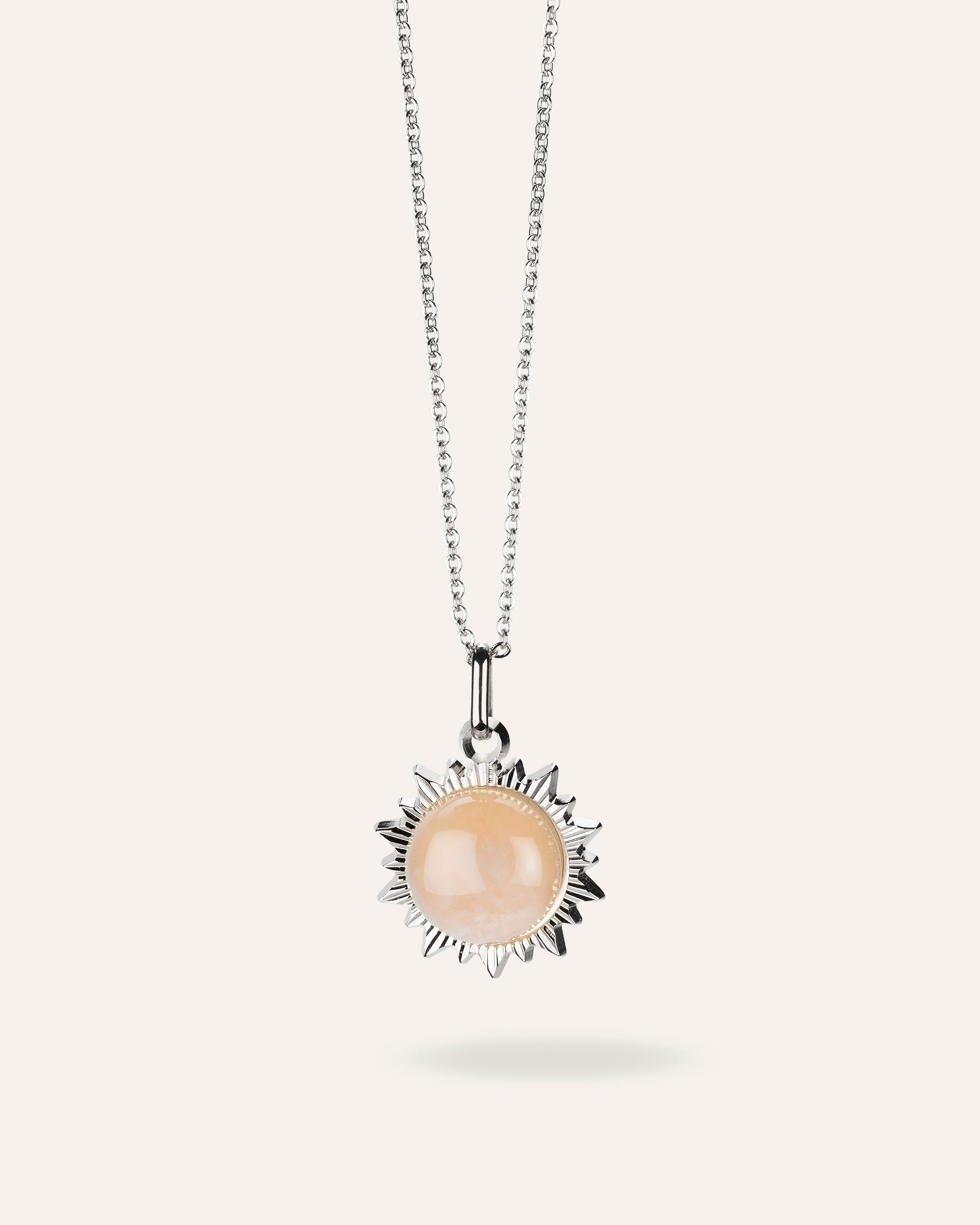 Silver and pink quartz sun necklace