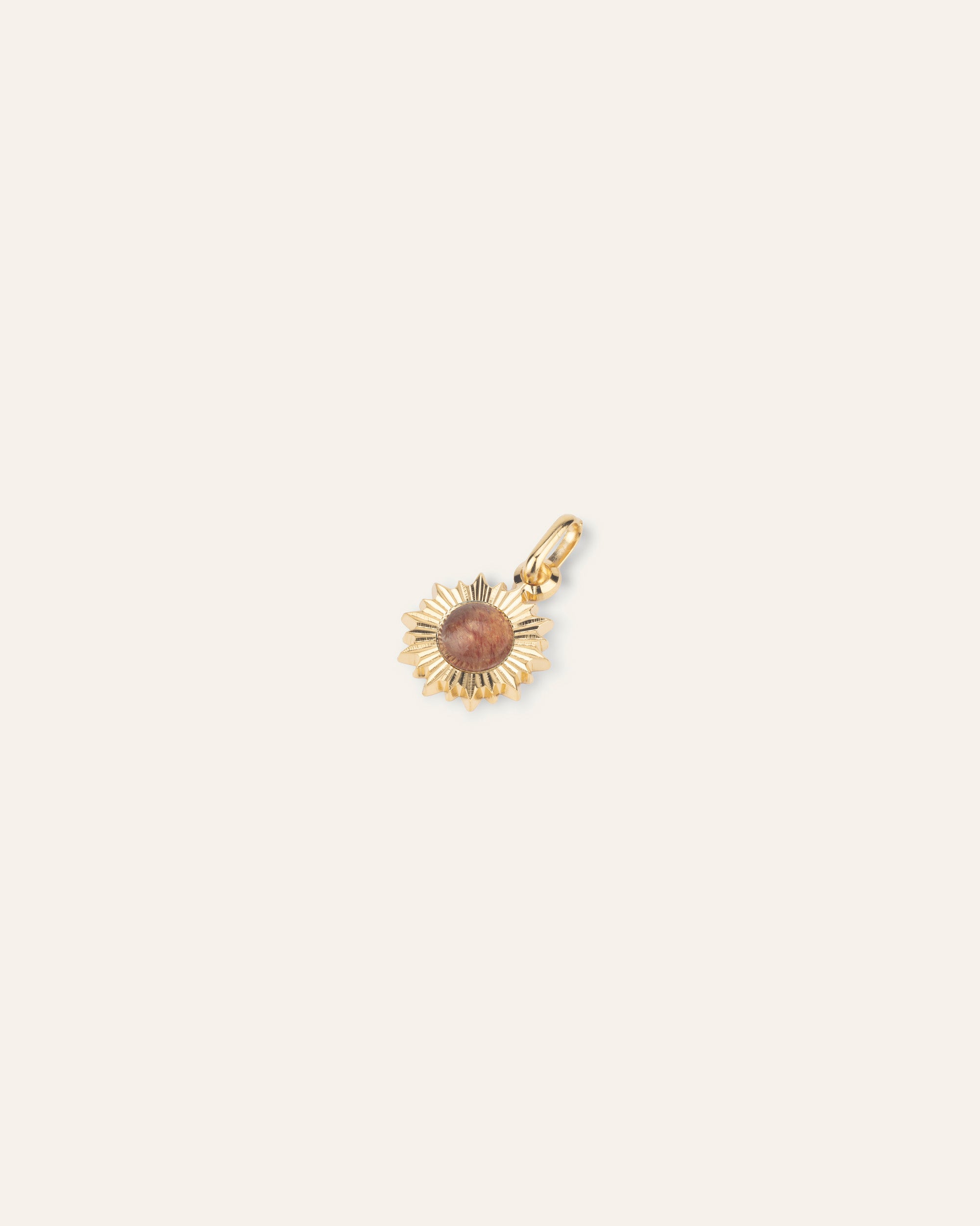 Ilios gold and raspberry quartz pendant